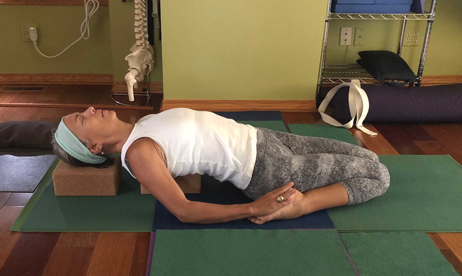 Pose of the Week Guide: Supine Hero/Supta Virasana - Oxygen Yoga Fitness